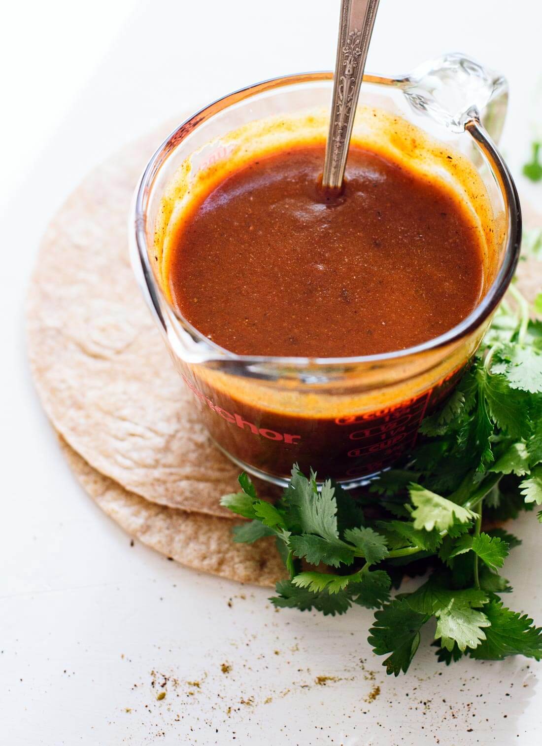 Learn how to make homemade enchilada sauce (it's so easy and so much better than the store-bought kind!) - cookieandkate.com