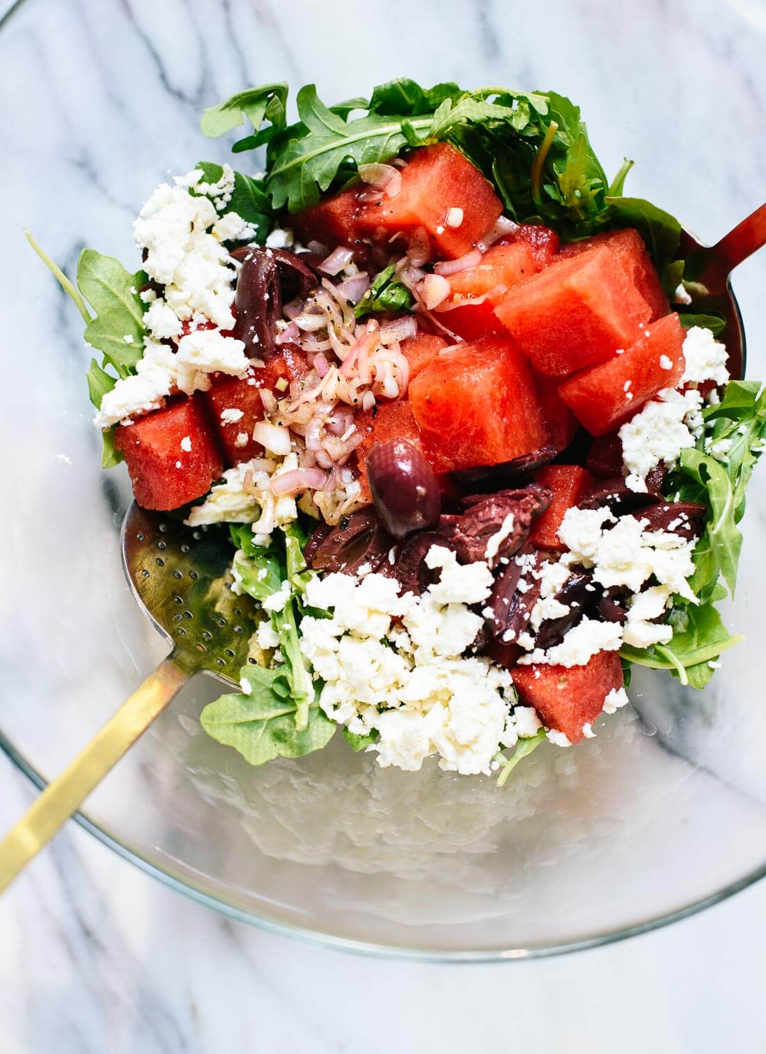 This surprising watermelon salad with greens is a perfect late summer salad! cookieandkate.com