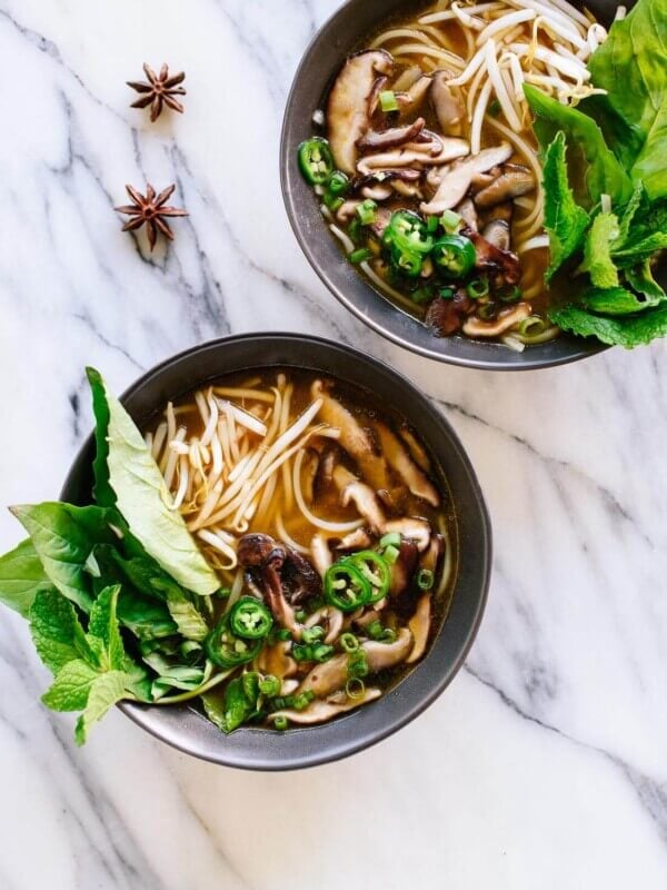 This meatless pho is full of flavor, thanks to spices, herbs and sautéed shiitake mushrooms! It’s fun to make, too. cookieandkate.com