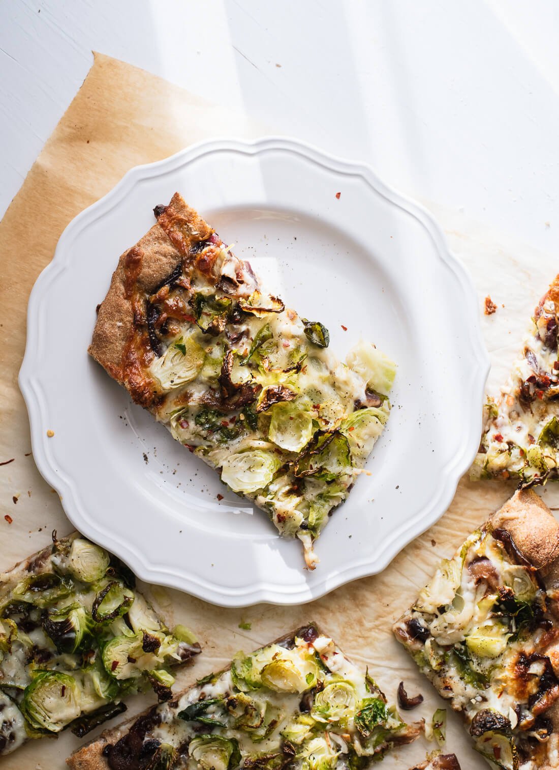 Brussels pizza with balsamic onions