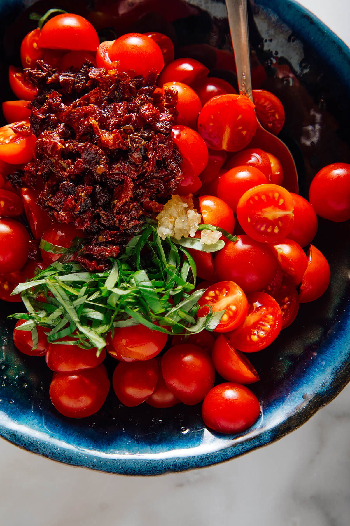 cherry tomatoes, sun-dried tomatoes, basil and garlic